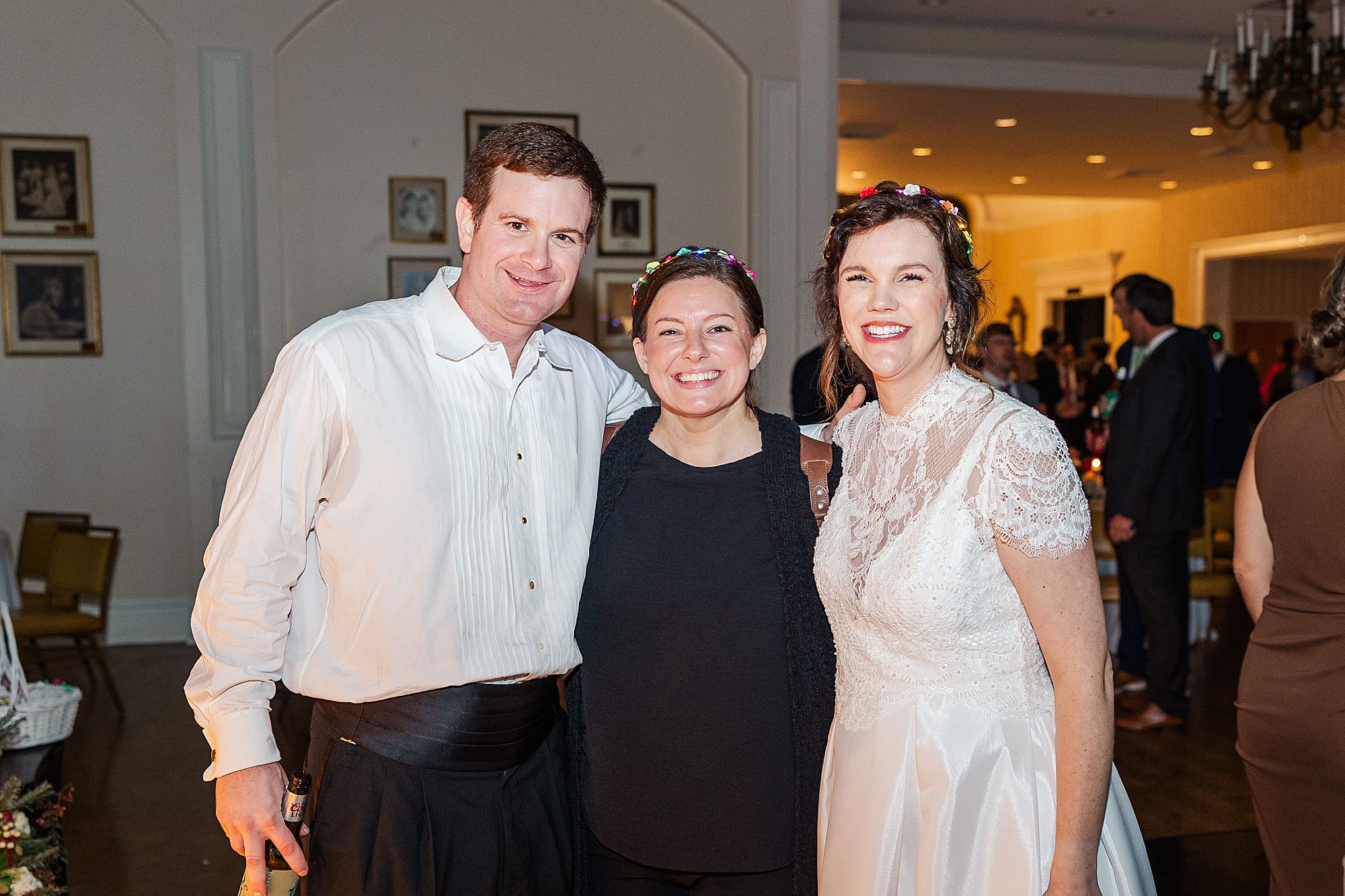 bride and groom with wedding photographer - Photography by Toni
