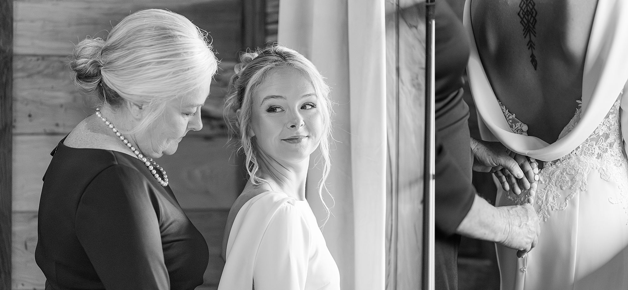 bride getting in dress