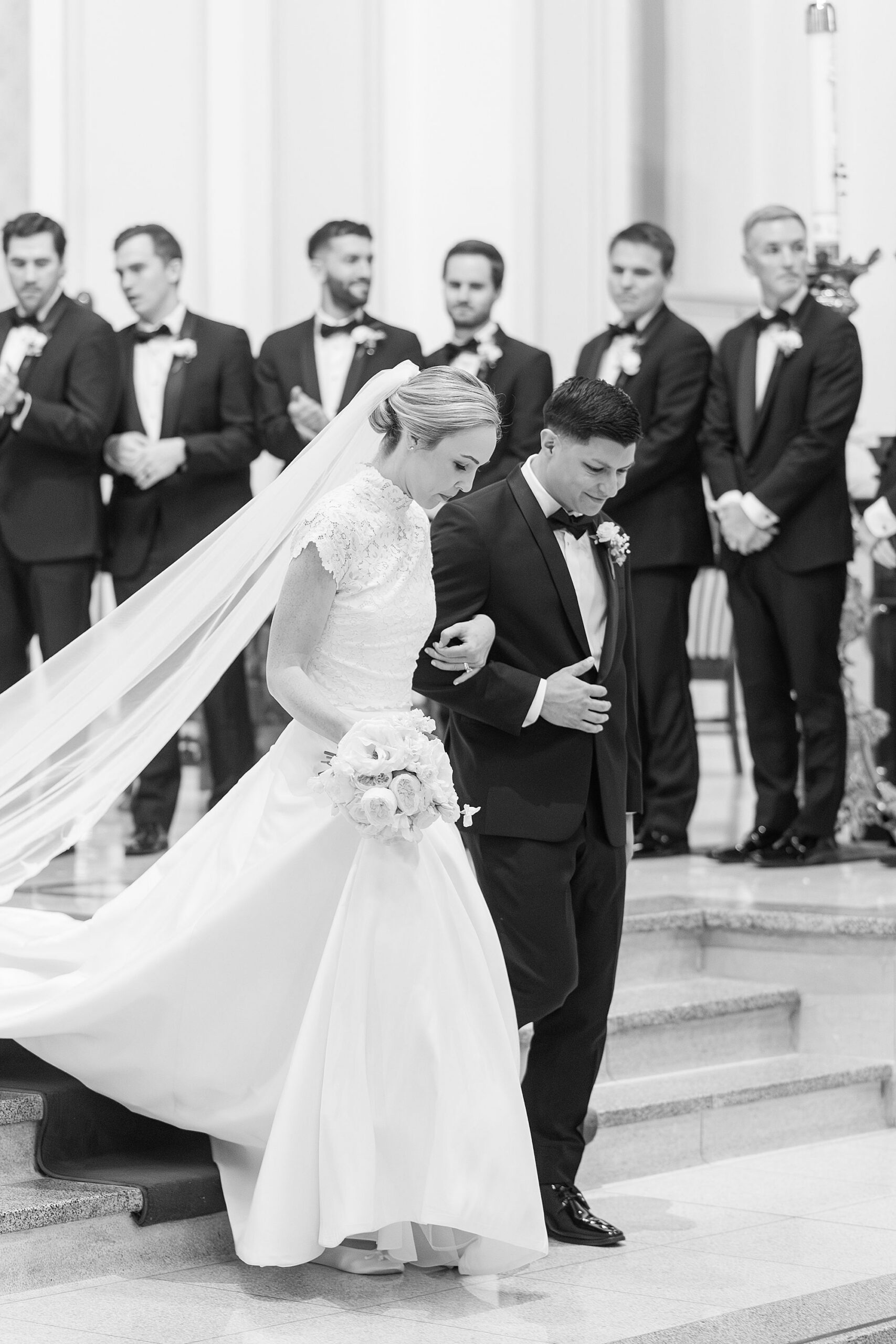 Bride and groom exit church 